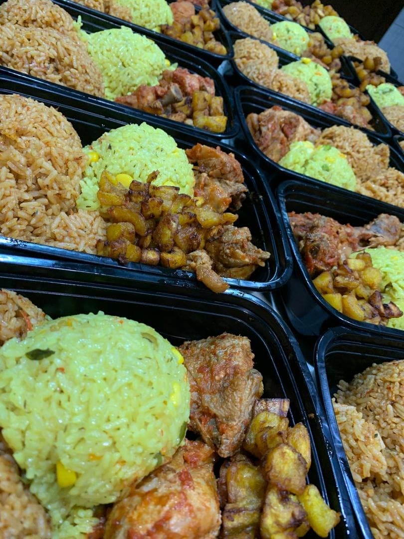 Jollof, coconut rice, chicken and plantain, packed